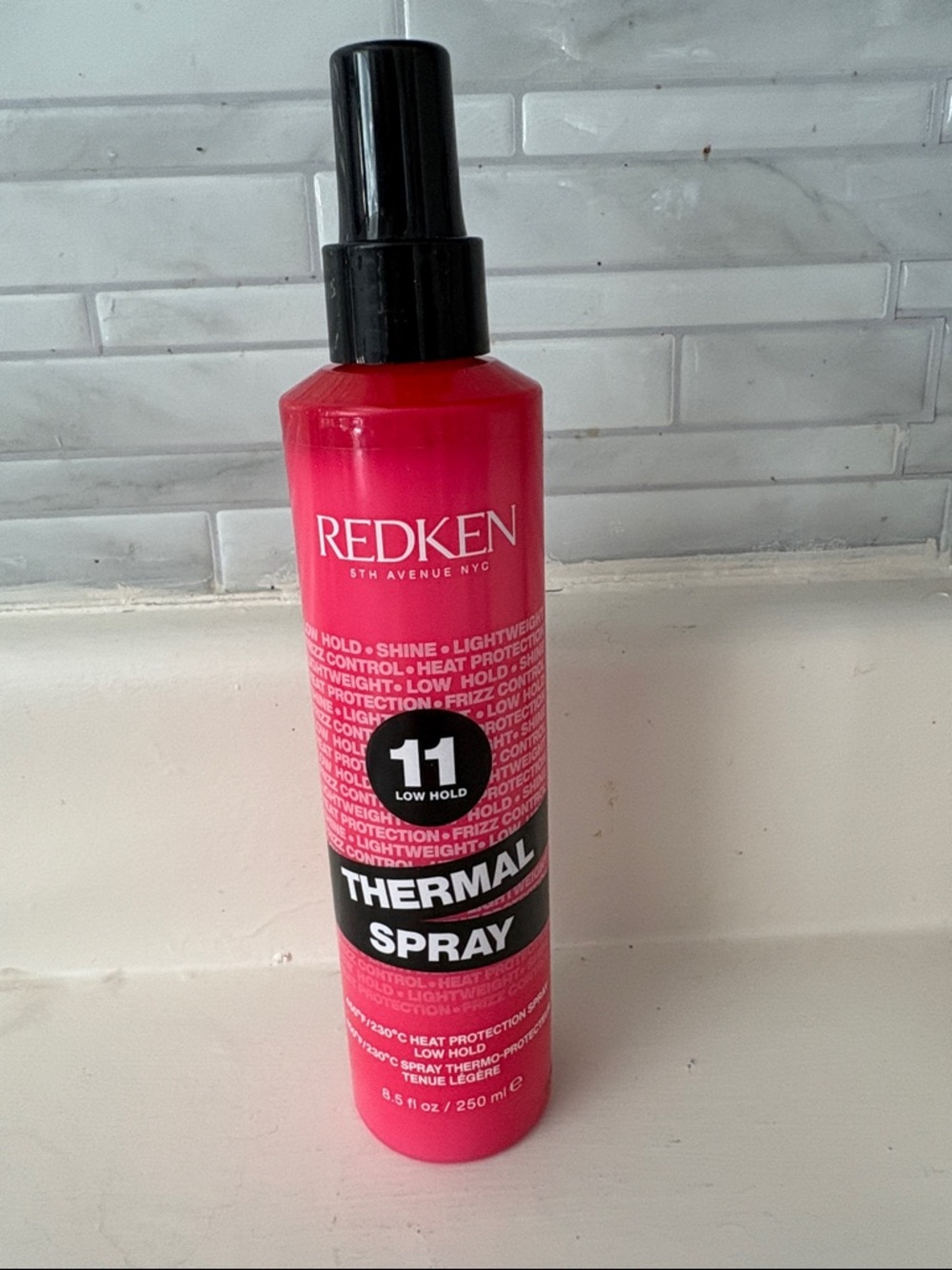 Redken Thermal Spray 11 in Bright Red Bottle with Black Cap